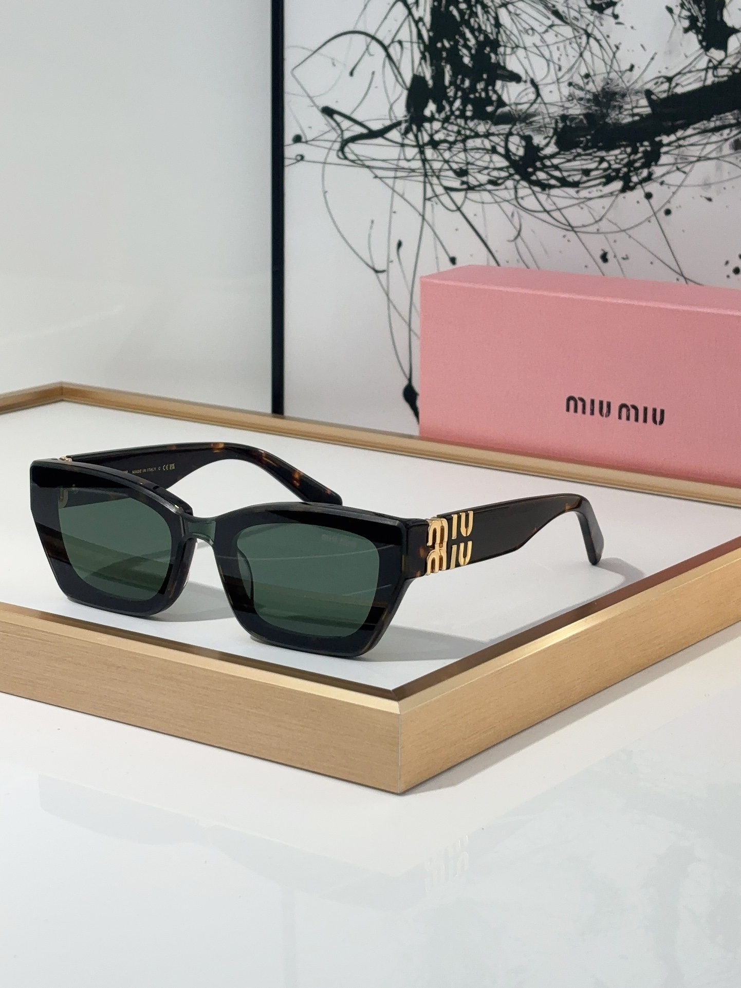 MiuMiu Sunglasses