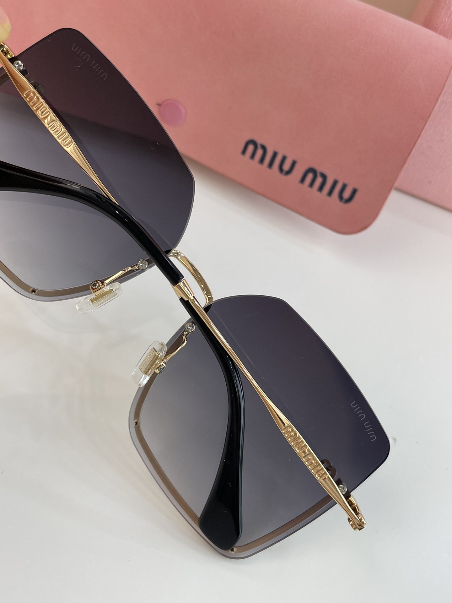 MiuMiu Sunglasses