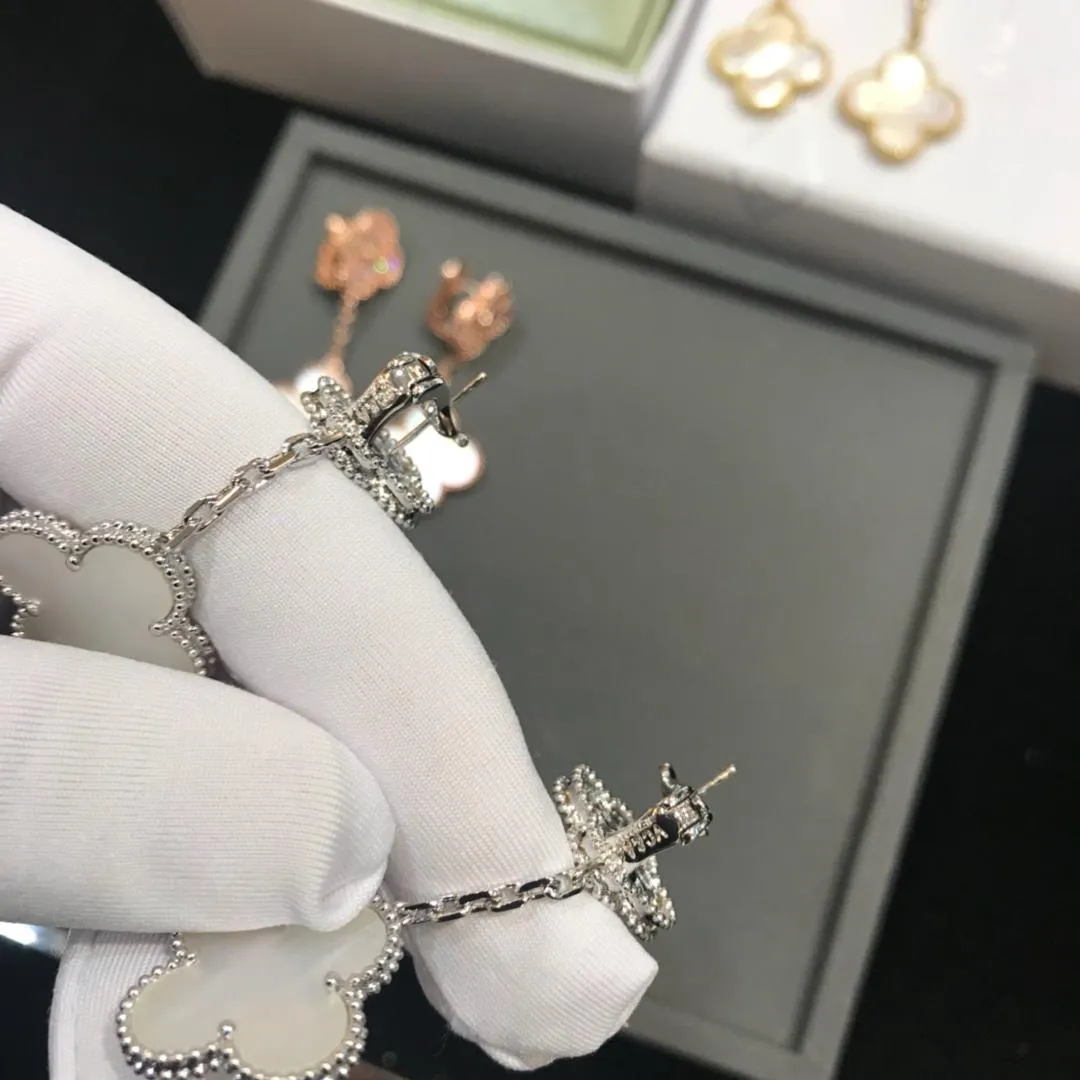 Van Cleef & Arpels Magic Alhambra Earrings 2 motifs Mother-of-pearl with Diamonds