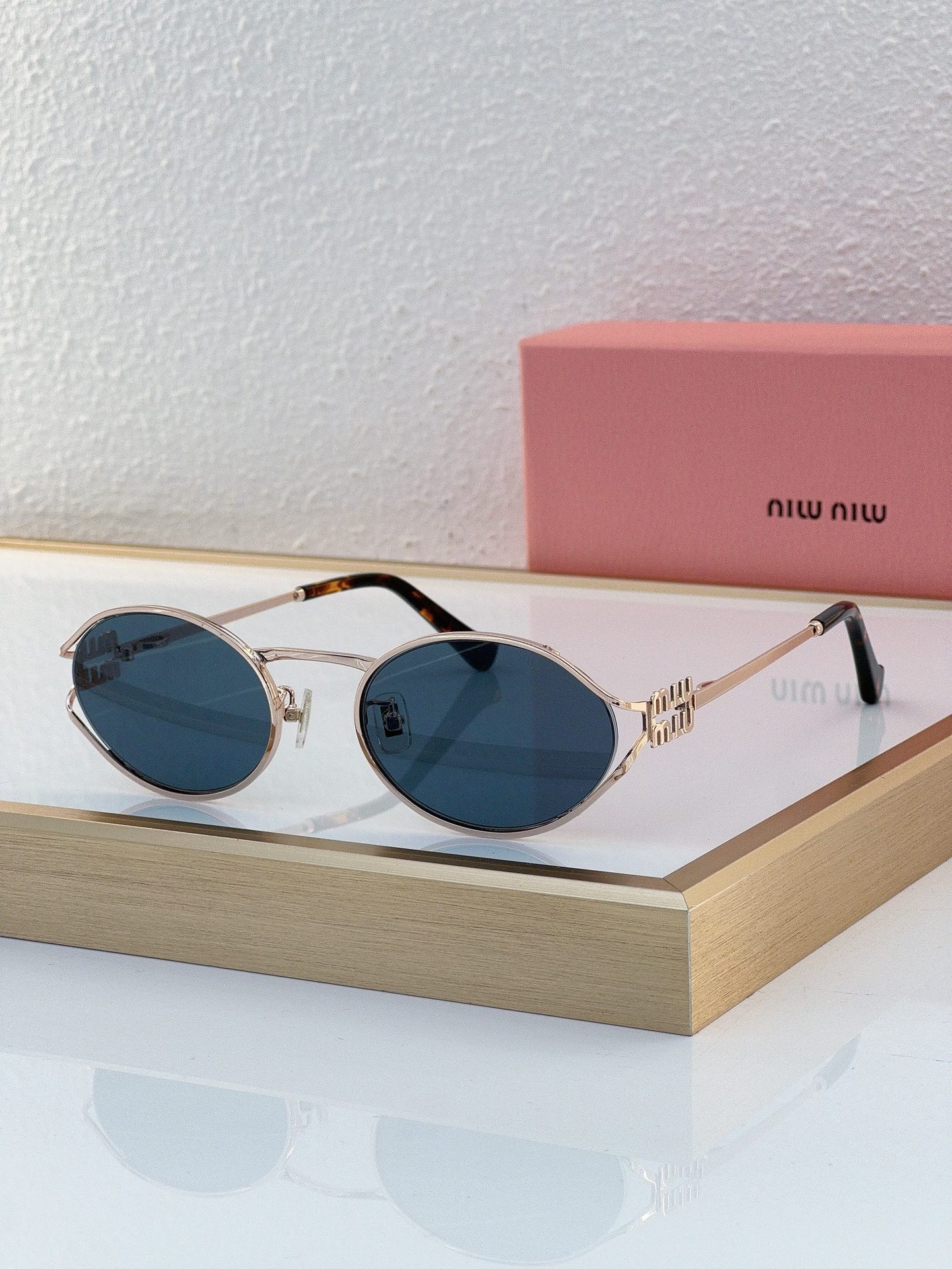 MiuMiu Sunglasses