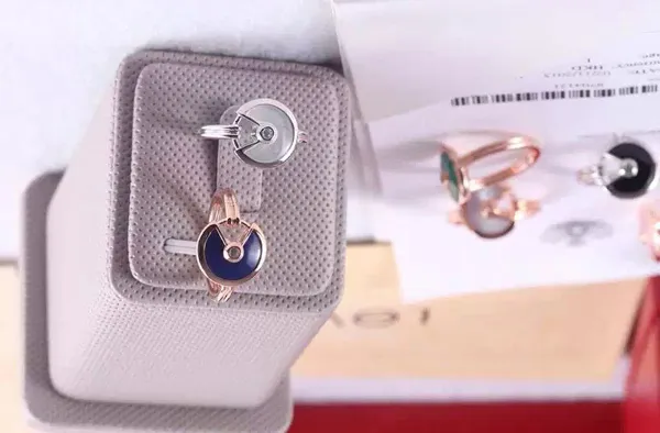 Amulette de Cartier White Mother-of-Pearl Ring With Diamond in Yellow Gold, White Gold and Pink Gold