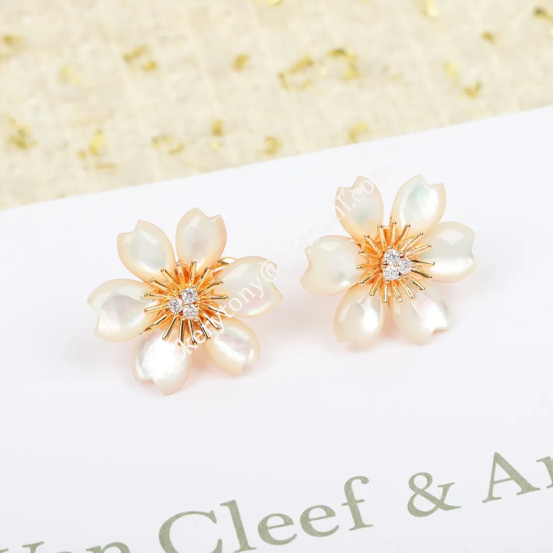 Hot Selling Van Cleef Arpels Rose de Noel Clip Earrings White/Blue With Diamonds Replica