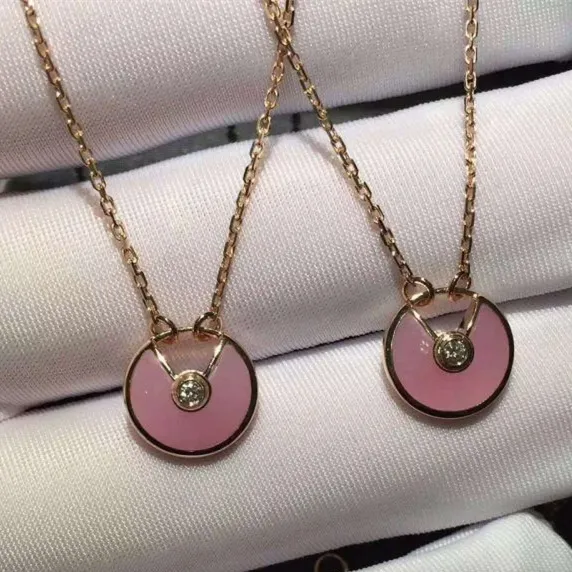 Amulette de Cartier Pink Opal Diamond Necklack in Yellow Gold, White Gold and Pink Gold