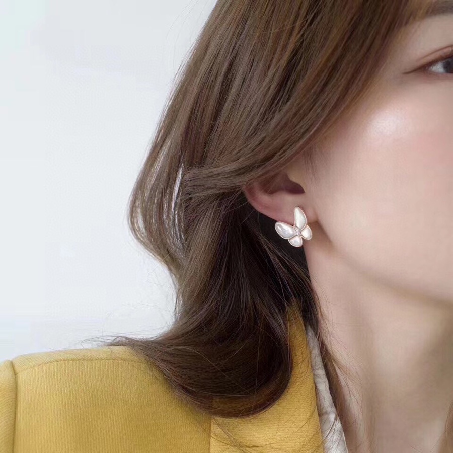 Van Cleef & Arpels Butterfly Earrings, Two Butterfly earrings