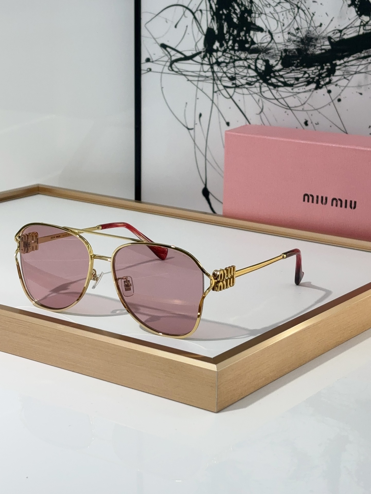 MiuMiu Sunglasses