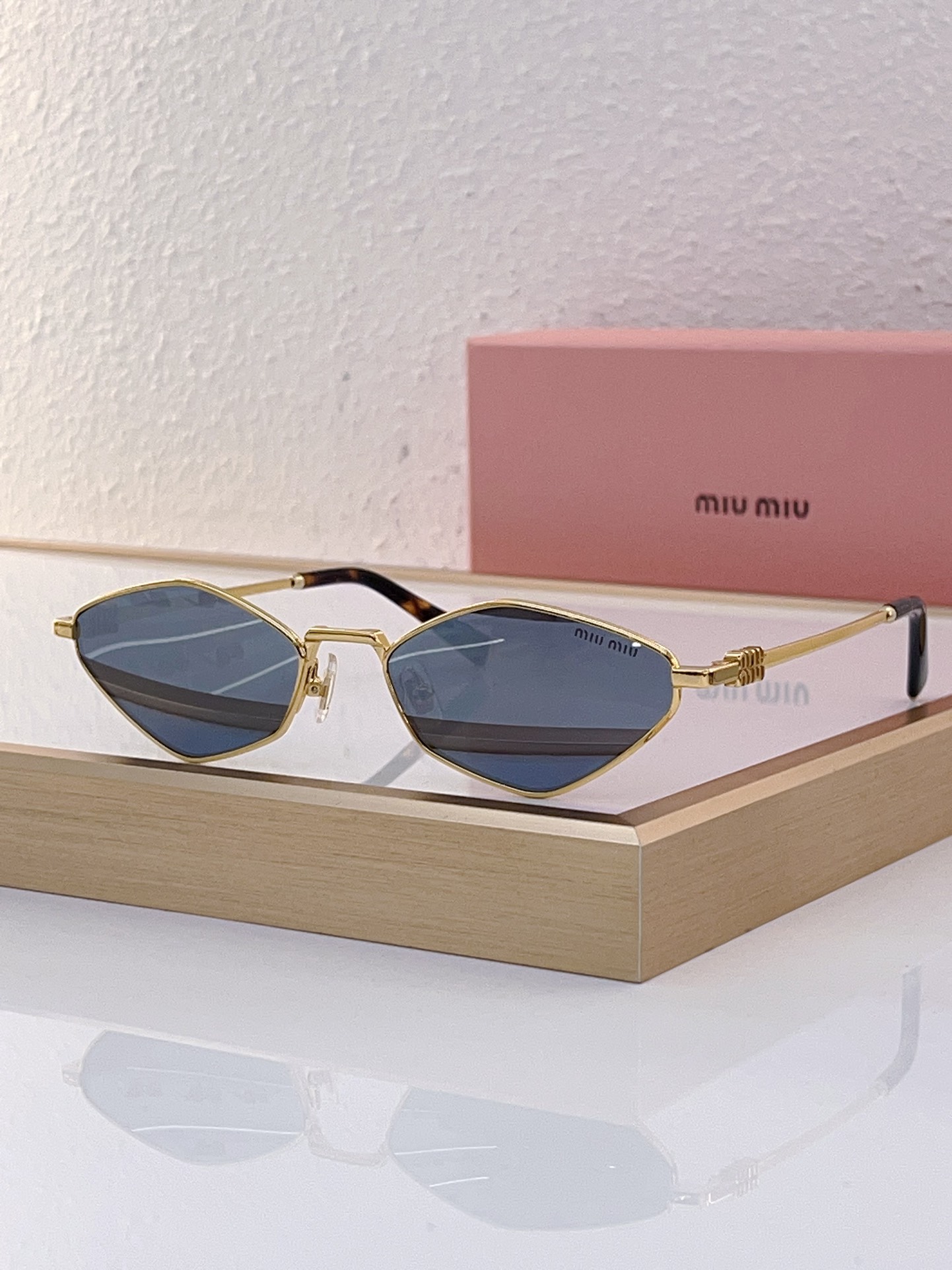 MiuMiu Sunglasses