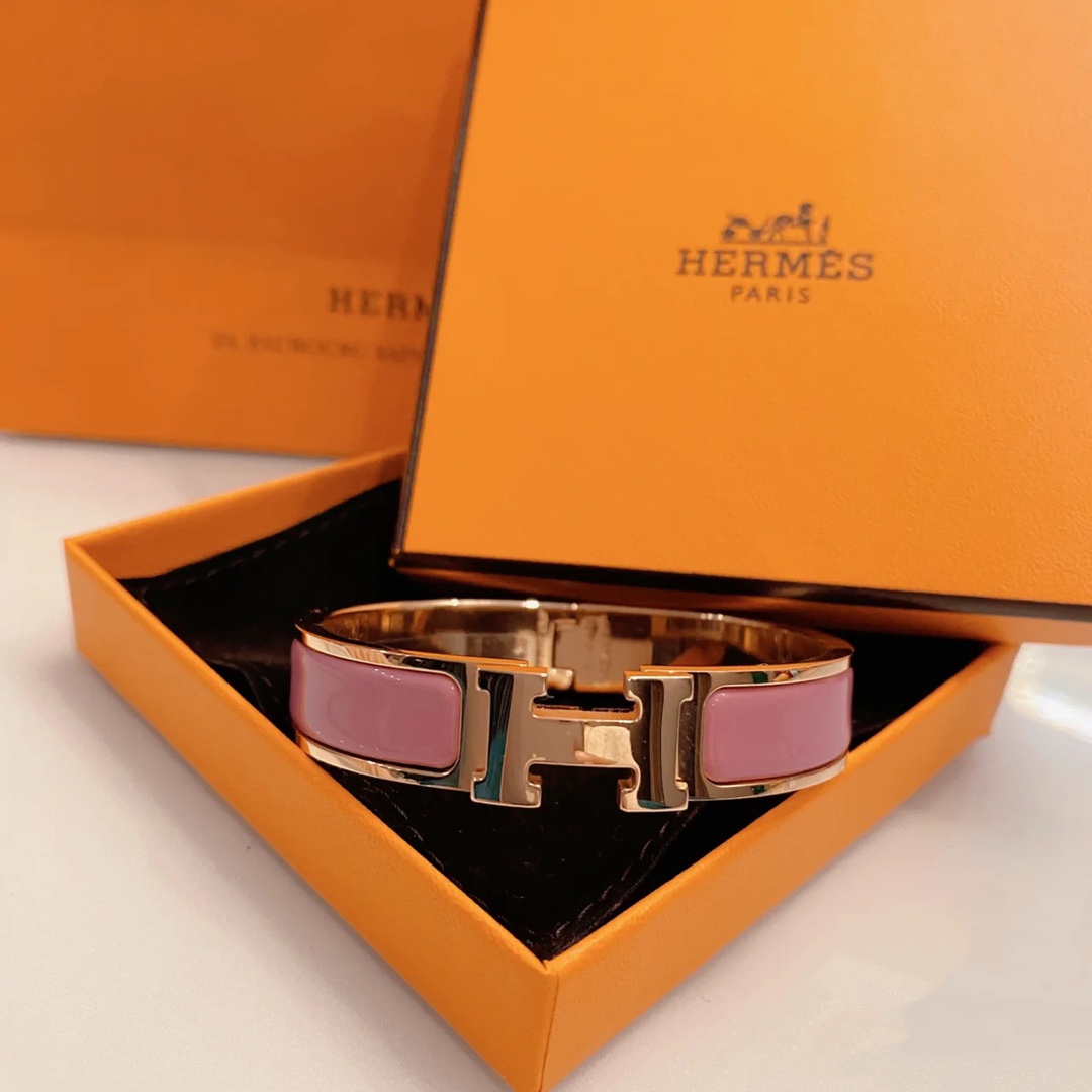 Hermes pink enameled bracelet with rose gold-tone border