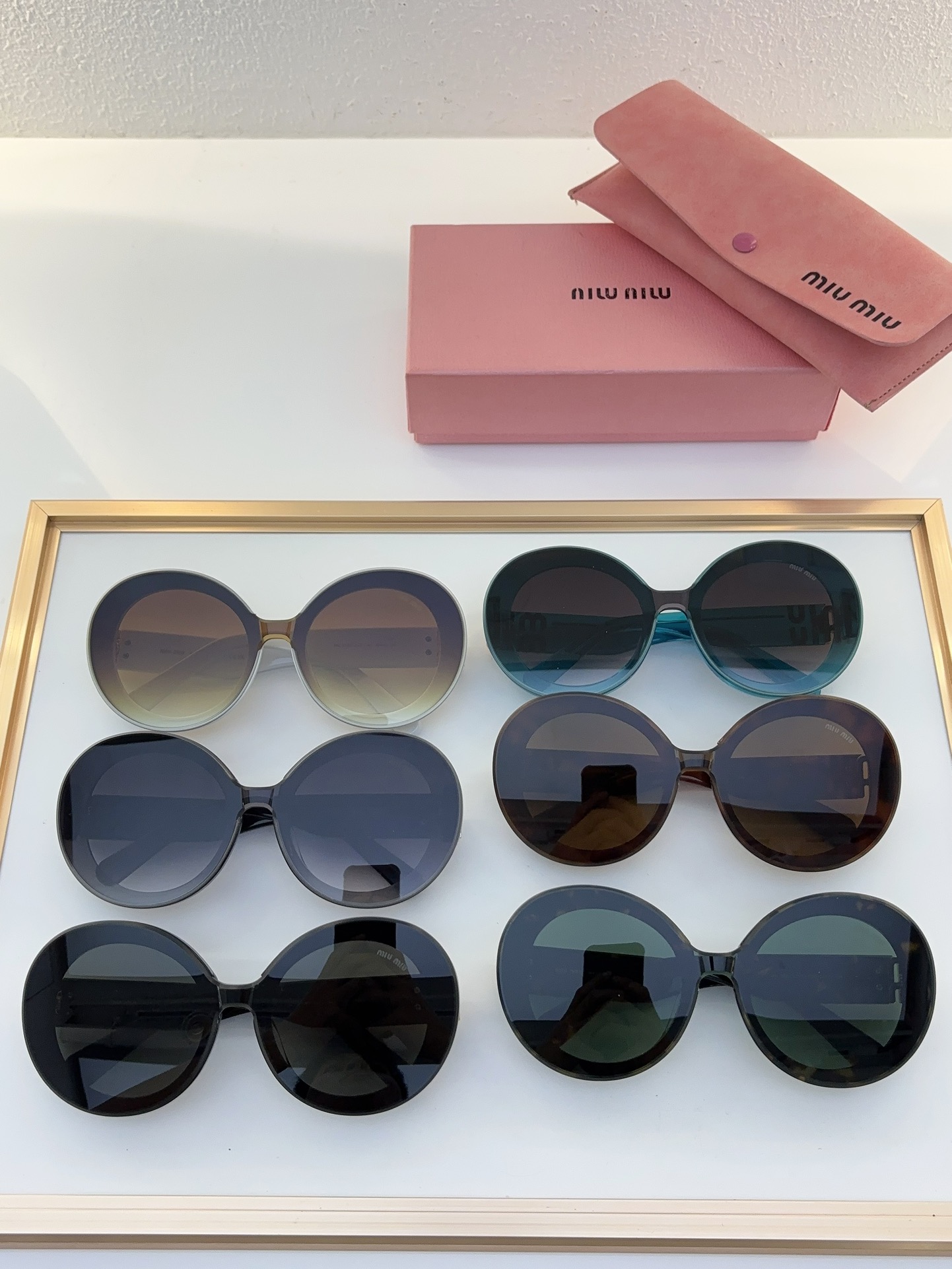 MiuMiu Sunglasses