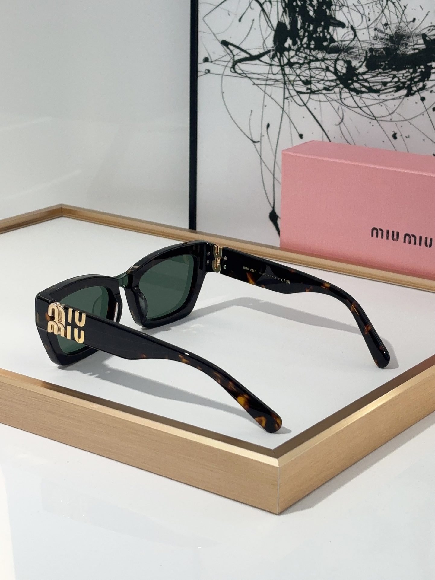 MiuMiu Sunglasses
