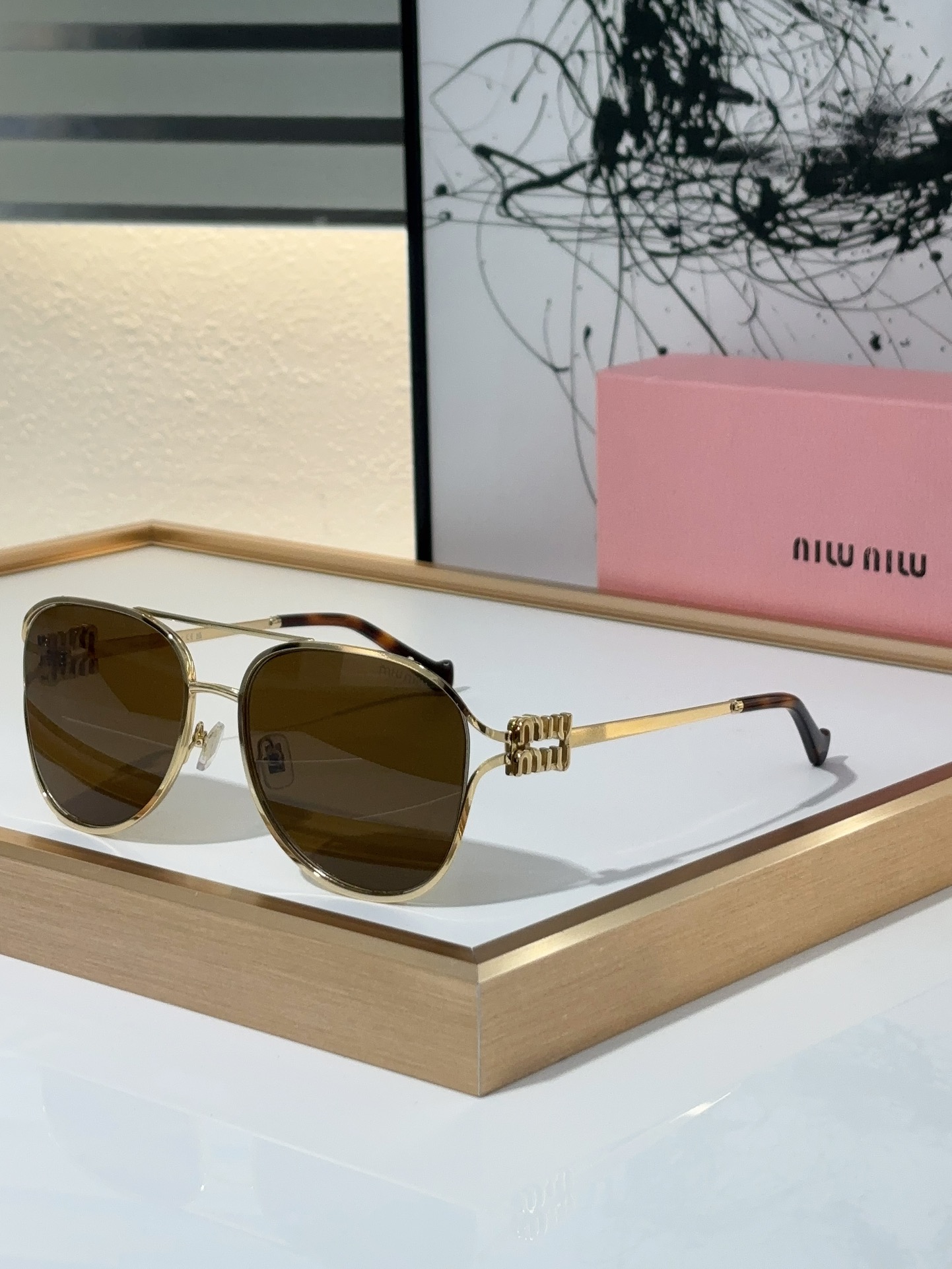 MiuMiu Sunglasses