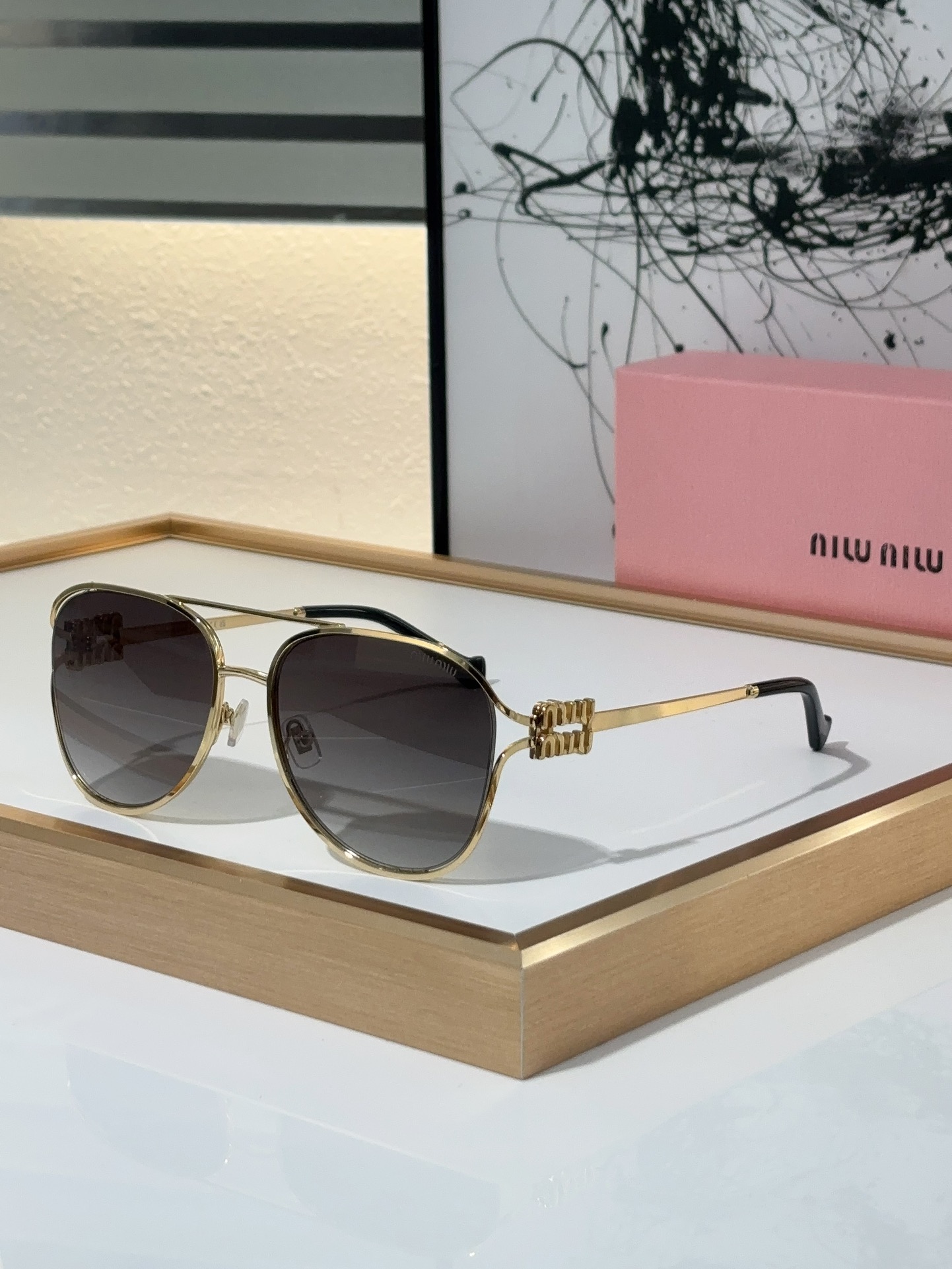 MiuMiu Sunglasses