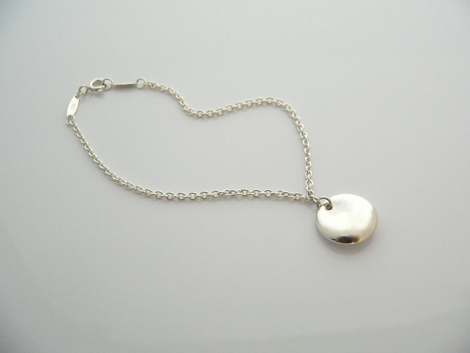 Tiffany & Co Silver Peretti Disc Circle Dangling Dangle Bracelet Bangle 7.25 Inch