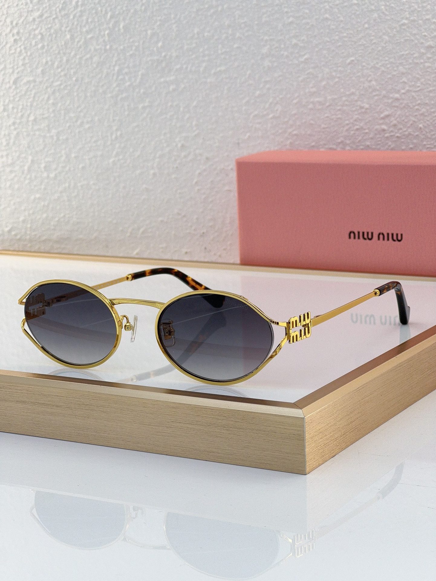MiuMiu Sunglasses