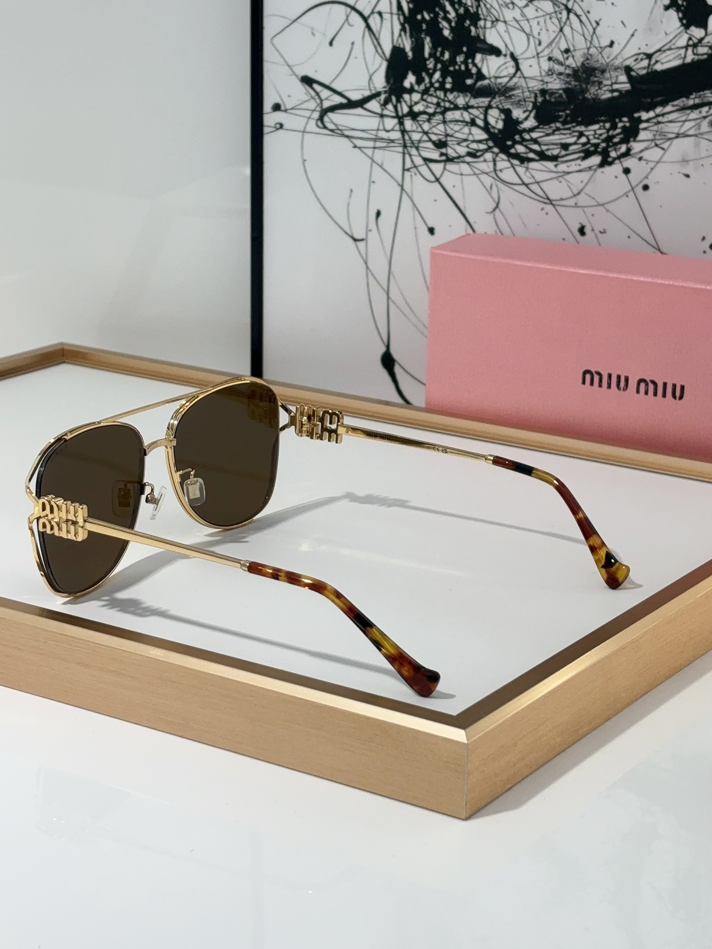 MiuMiu Sunglasses