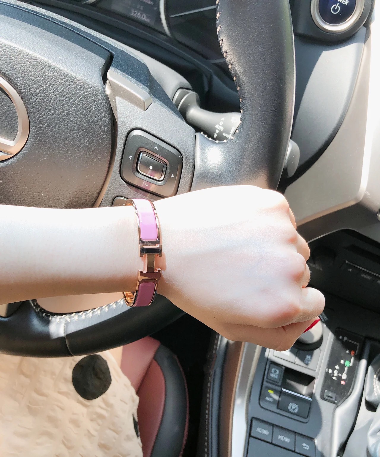 Hermes pink enameled bracelet with rose gold-tone border