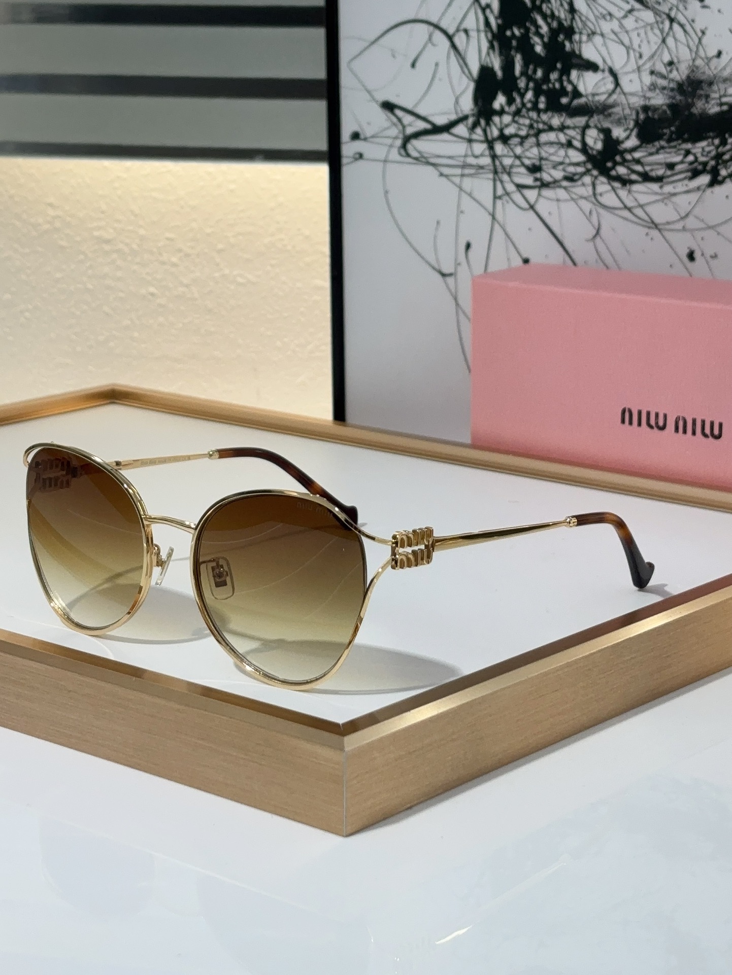 MiuMiu Sunglasses