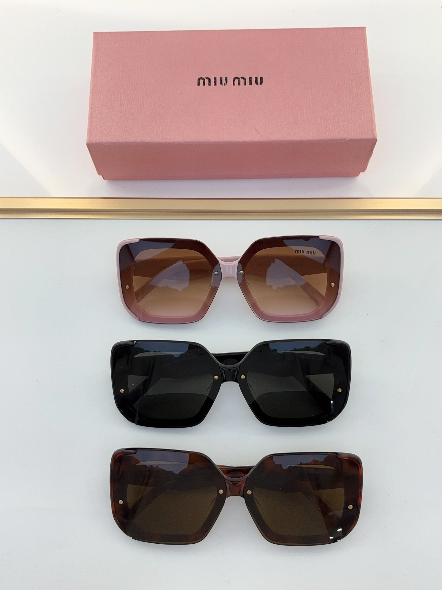 MiuMiu Sunglasses
