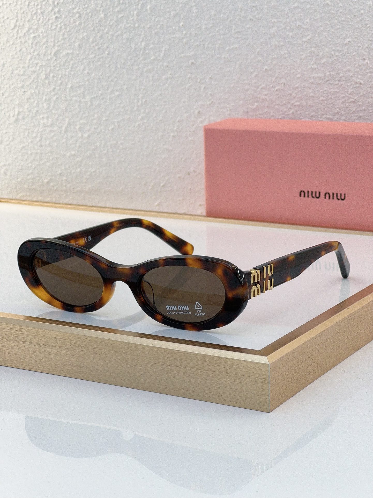 MiuMiu Sunglasses