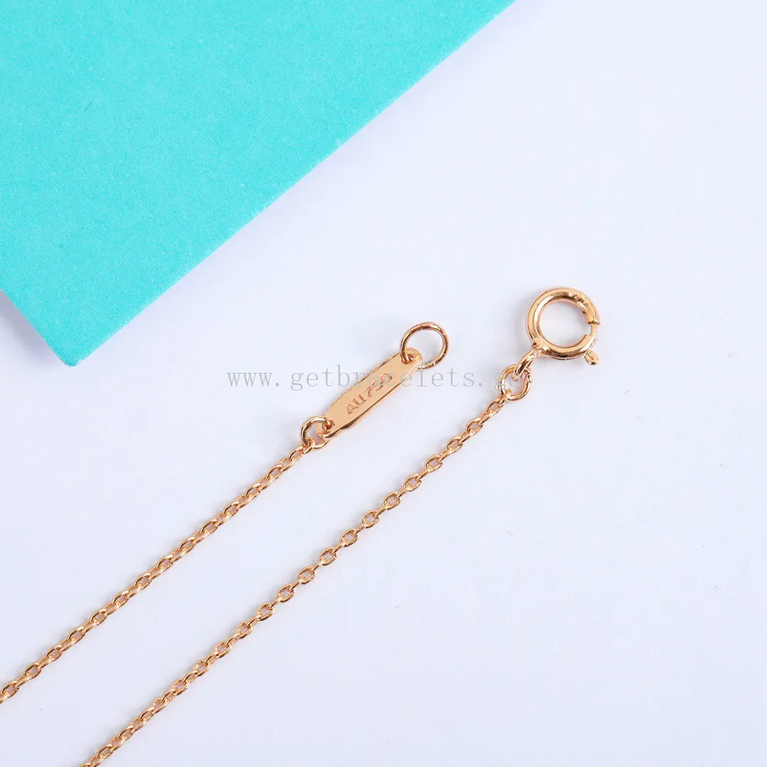 Tiffany Keys Crown Key in Rose Gold/White Gold with Diamonds