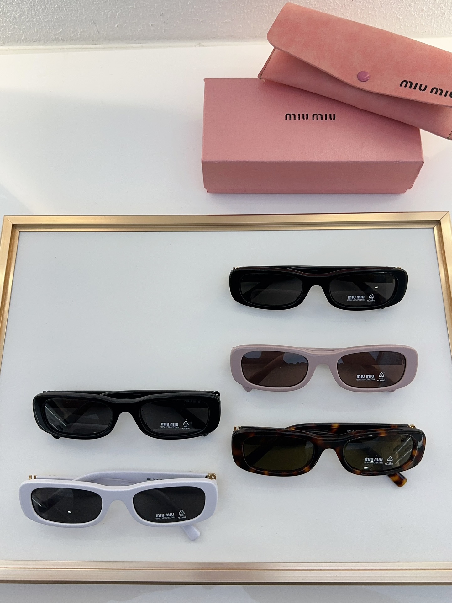 MiuMiu Sunglasses