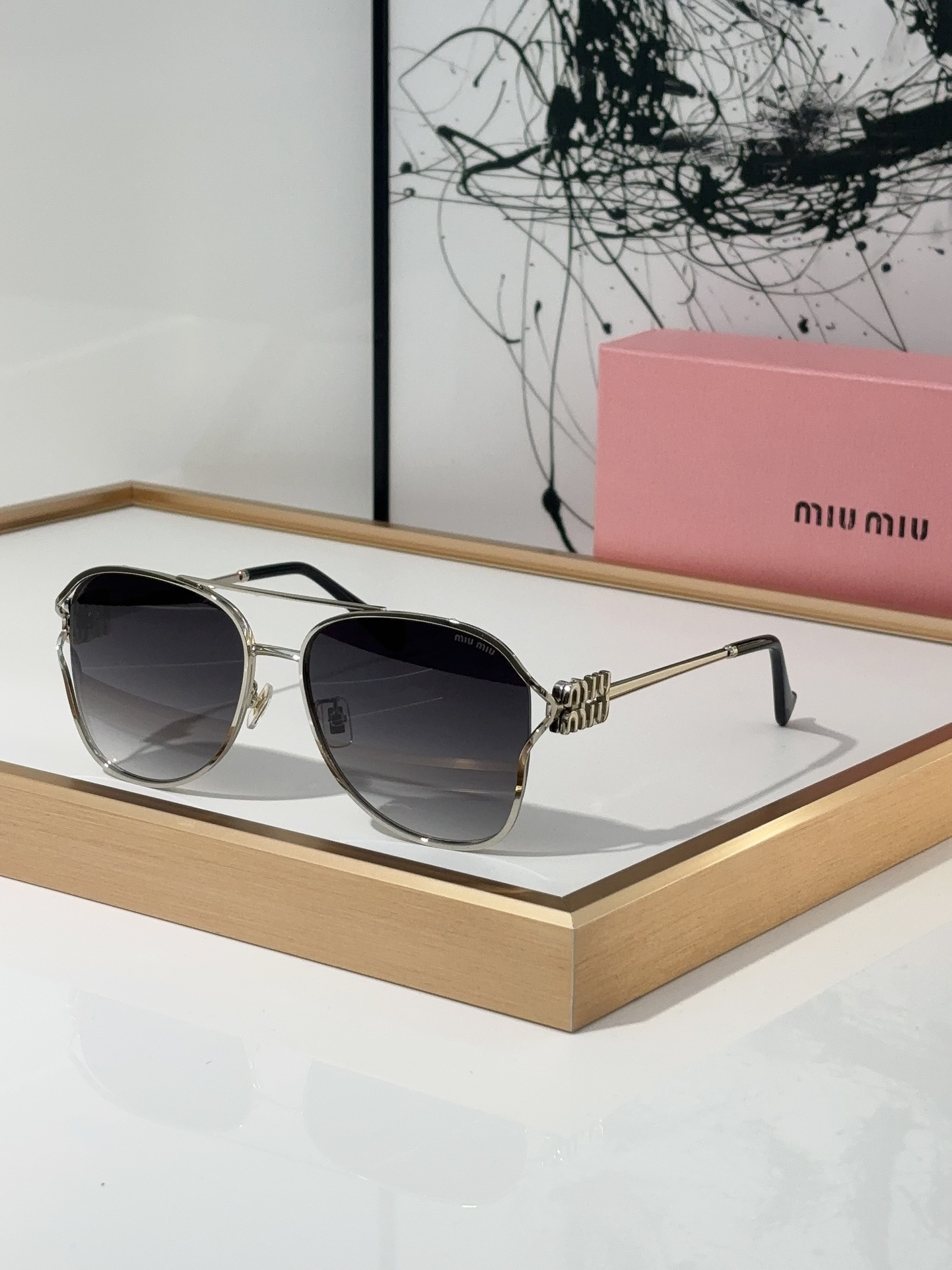 MiuMiu Sunglasses