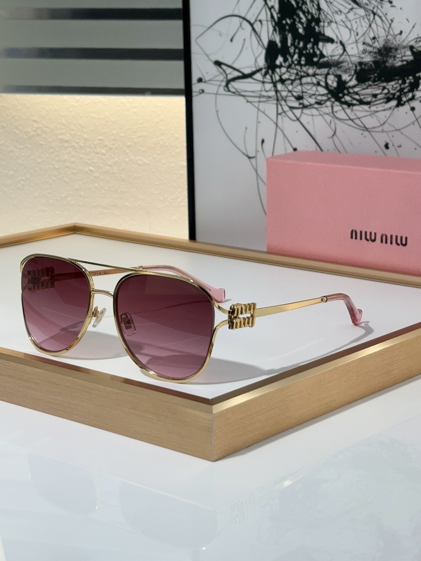 MiuMiu Sunglasses