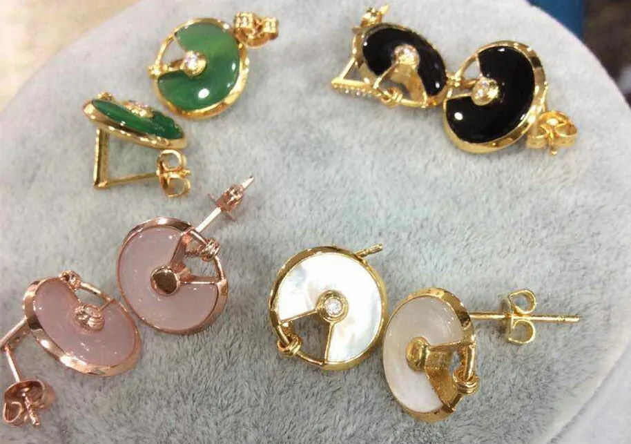 Amulette de Cartier White Mother-of-Pearl Ring With Diamond in Yellow Gold, White Gold and Pink Gold