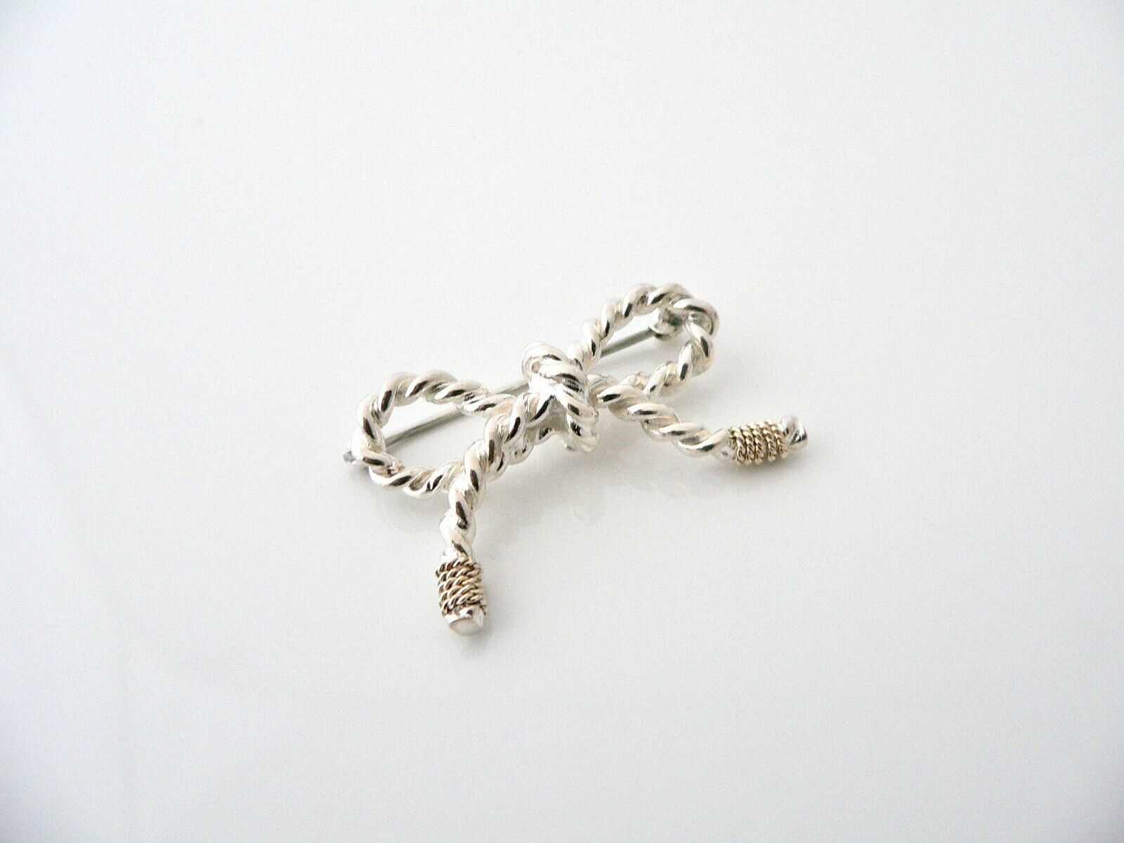 Tiffany & Co Ribbon Pin Textured Twisted Brooch Silver 14K Gold Love Gift Rare