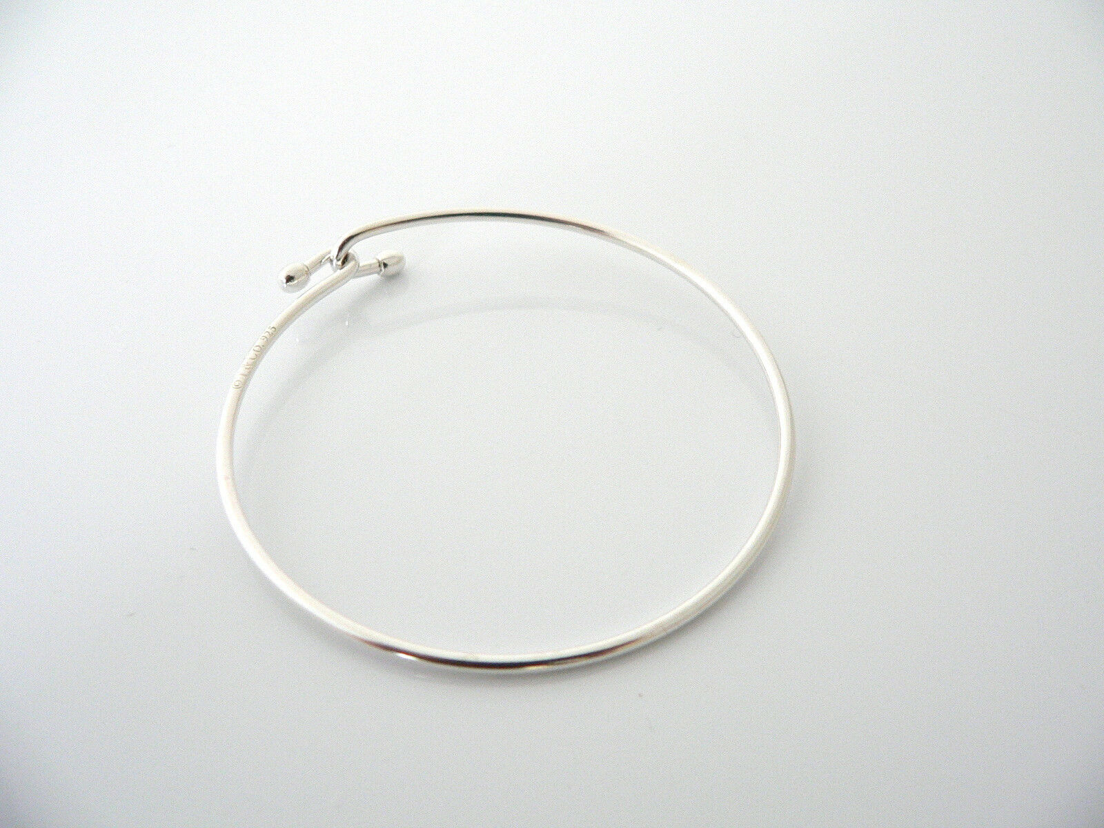 Tiffany & Co Silver Love Knot Hook Bangle Bracelet Infinity Interlocking Gift