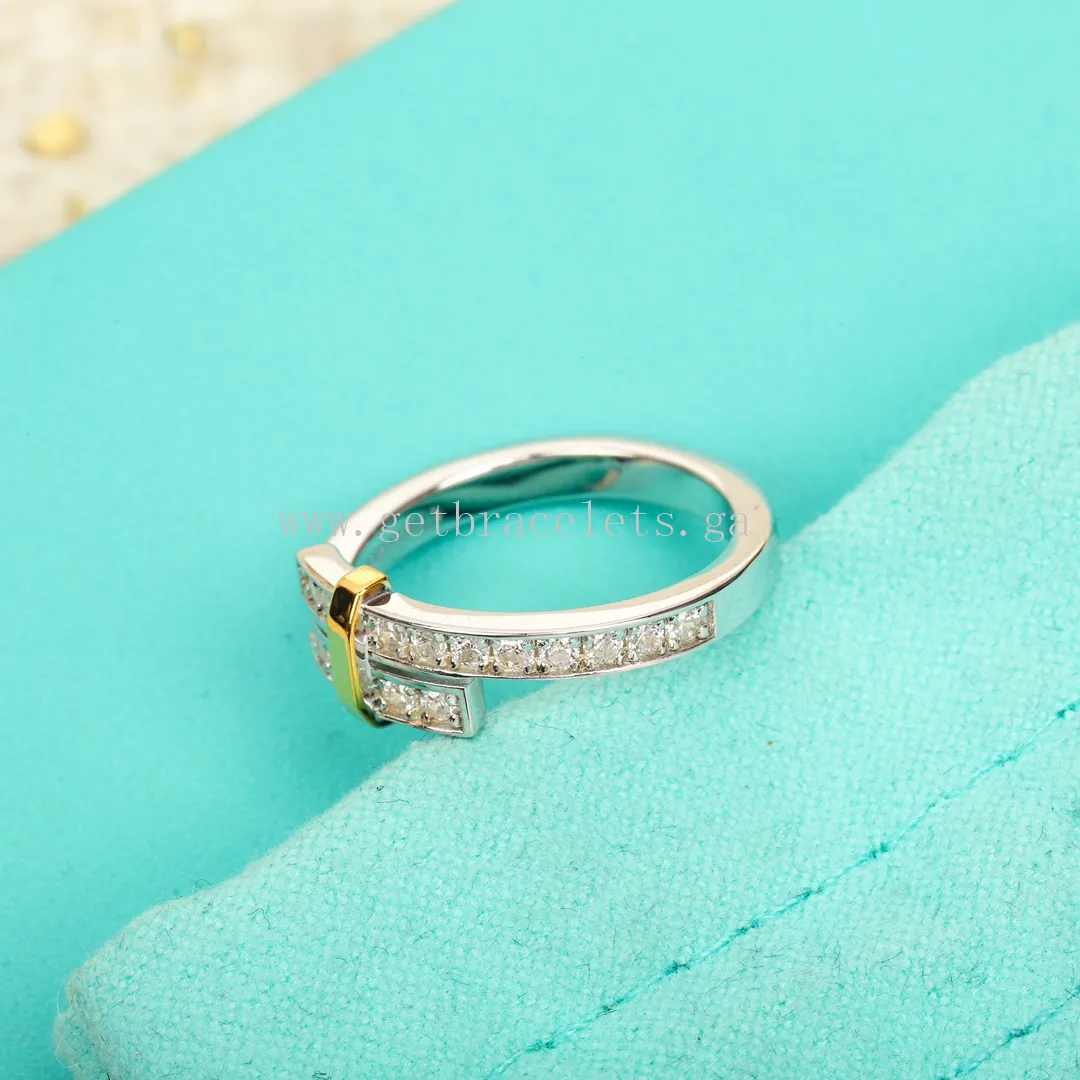 Tiffany Edge Bypass Ring in Platinum and Yellow Gold with Diamonds