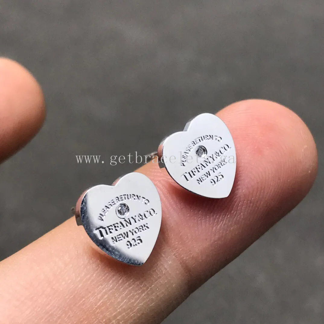 Return to Tiffany Heart Tag Earrings in Sterling Silver with a Diamond
