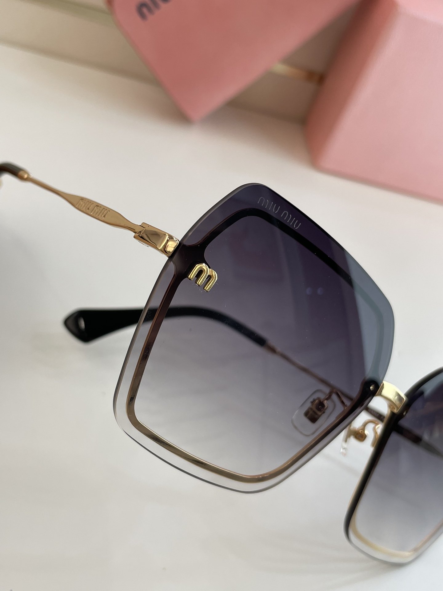 MiuMiu Sunglasses
