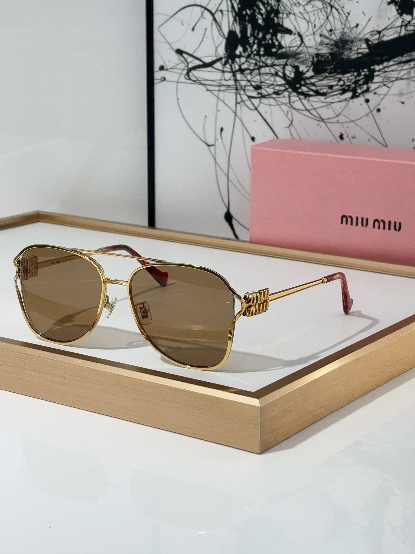 MiuMiu Sunglasses