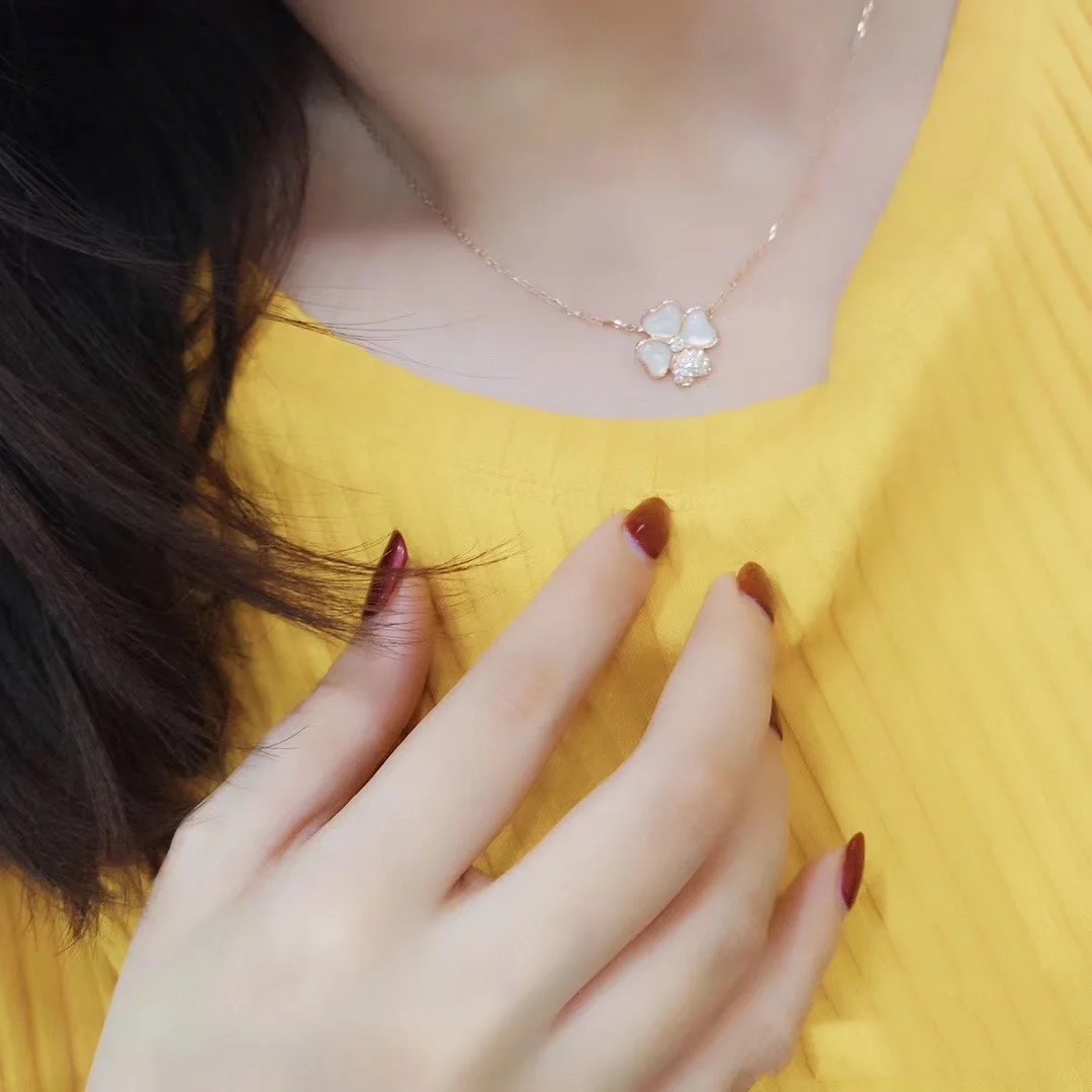 Van Cleef & Arpels four-leaf clover necklace, one leaf with diamonds