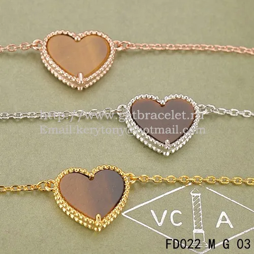 Van Cleef Arpels Sweet Alhambra Heart Pendant Yellow Gold With Tiger's Eye Mother Of Pearl