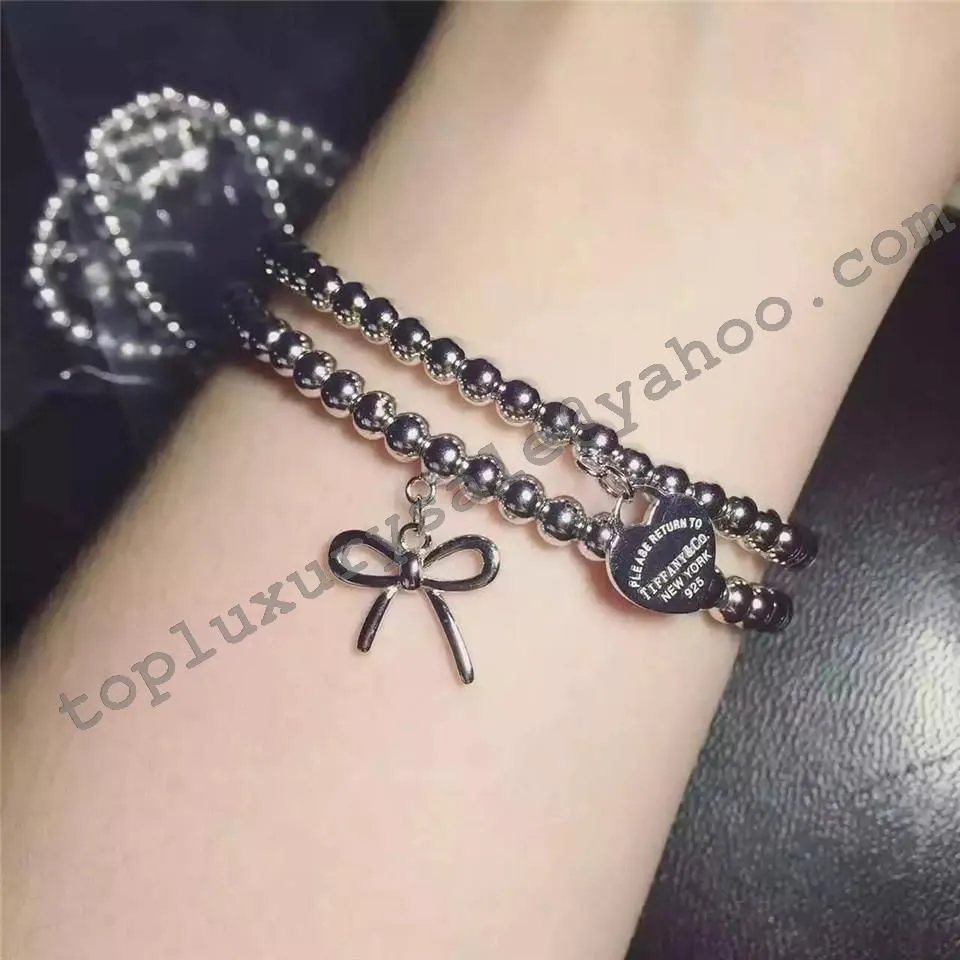 Knockoff Tiffany Bow Bead Bracelet 925 Sterling Silver Toned UK Price GRP06349