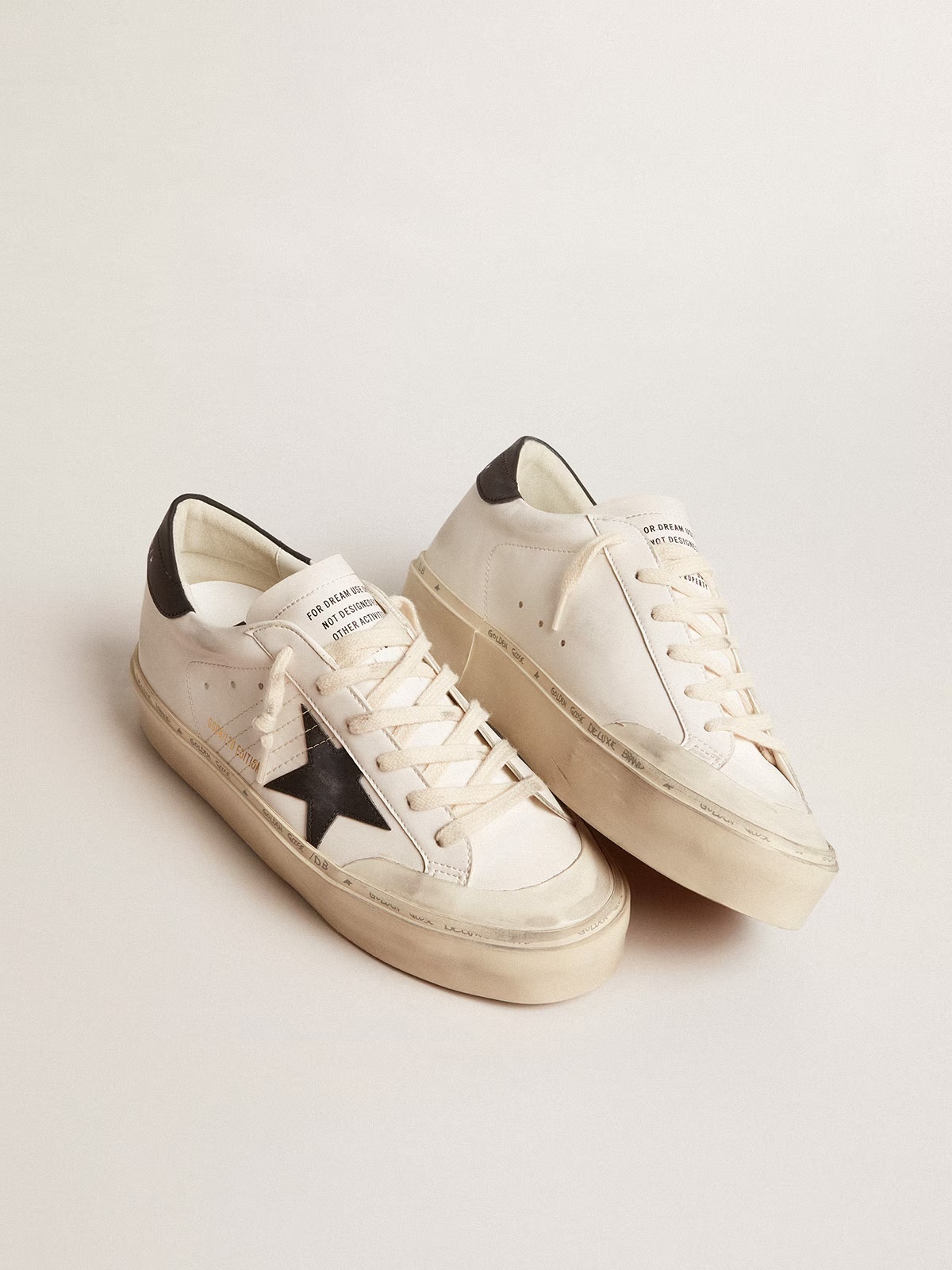 Golden Goose GGDB Woman's white bio-based Hi Star LTD with black bio-based star and heel tab