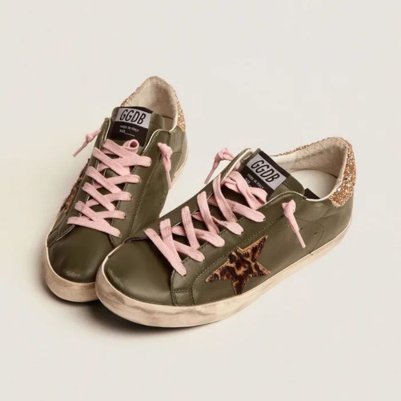 Golden Goose GGDB Super-Star sneakers in dark green leather with gold glitter heel tab