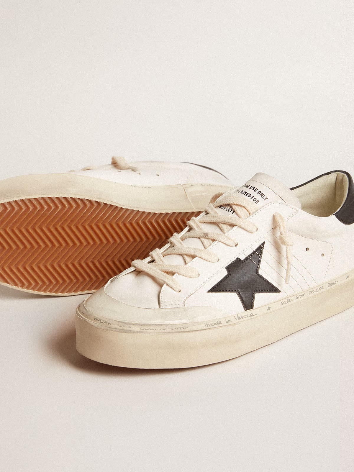 Golden Goose GGDB Woman's white bio-based Hi Star LTD with black bio-based star and heel tab