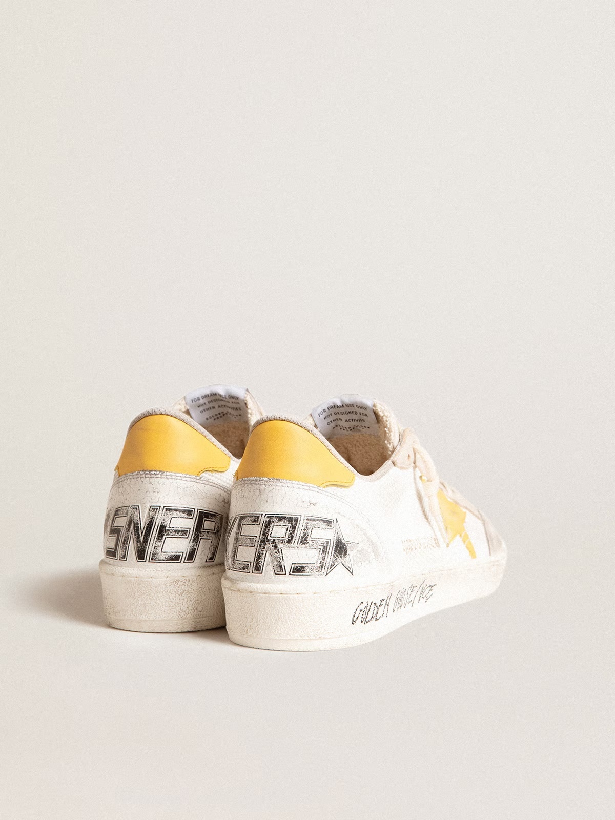 Golden Goose GGDB Ball Star LTD in white mesh with yellow leather star and heel tab
