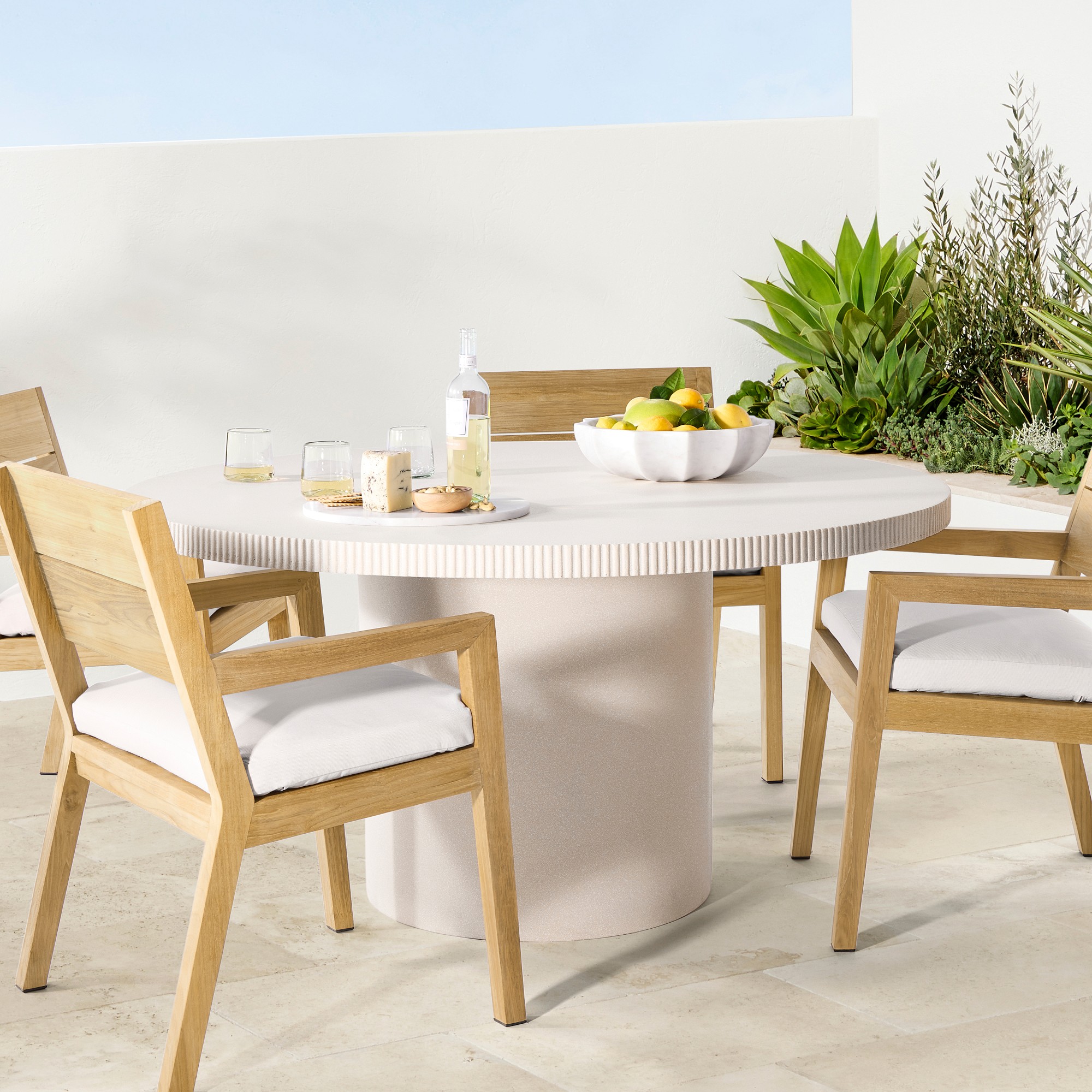 Hollis Round Fiberstone Outdoor Dining Table (59