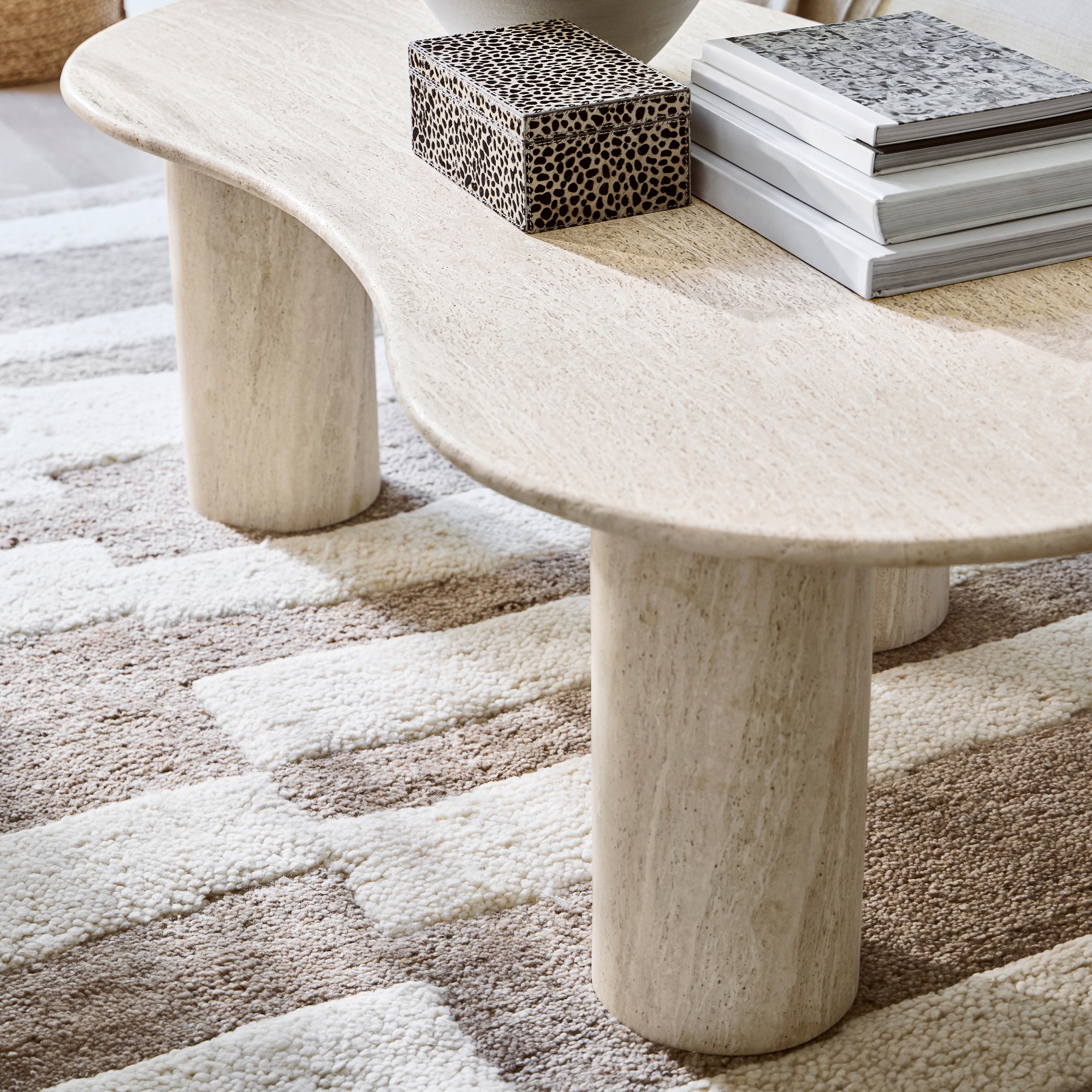 Marina Travertine Sculptural Coffee Table (55