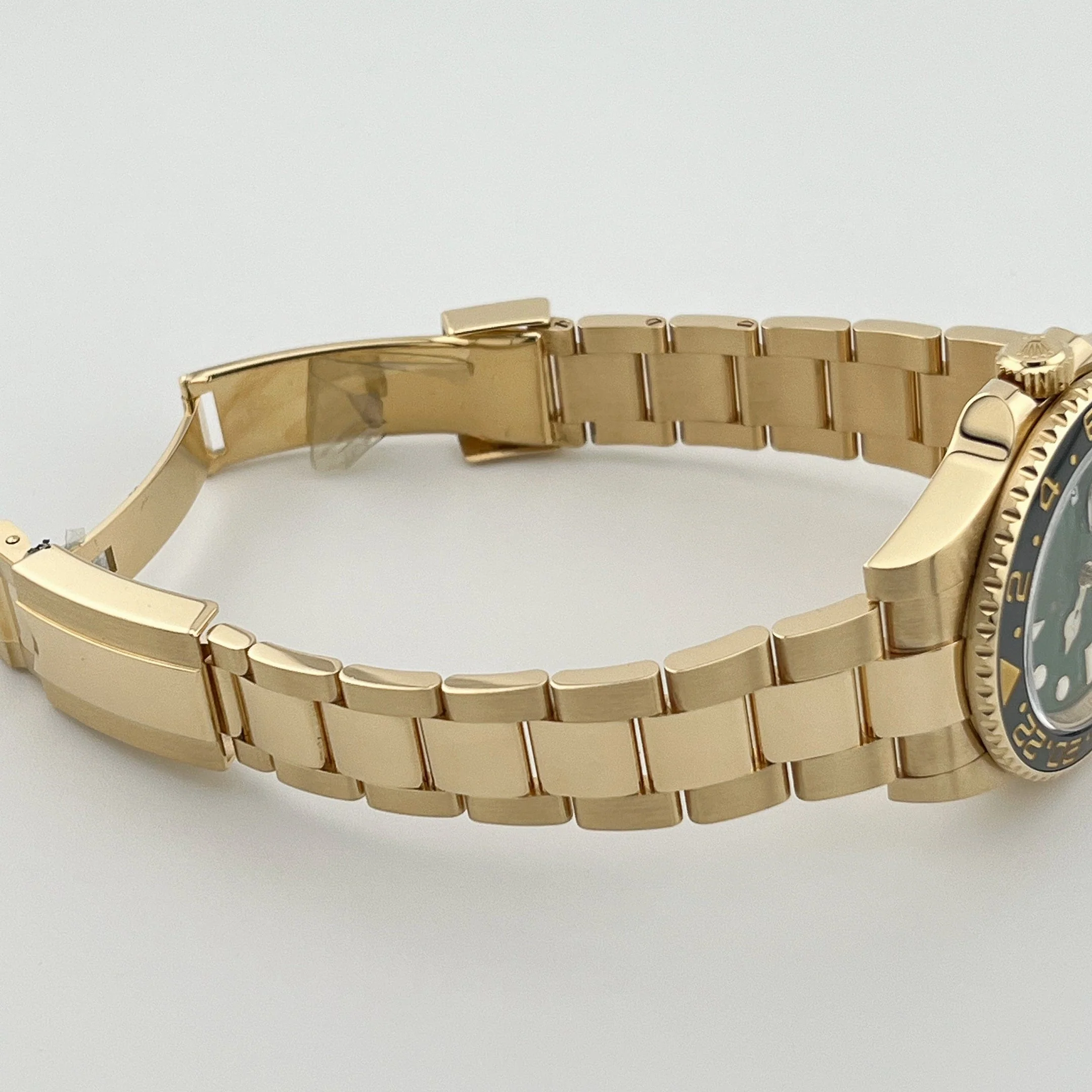 Rolex GMT-Master II 116718LN Yellow Gold Green Dial Black Bezel (2006)