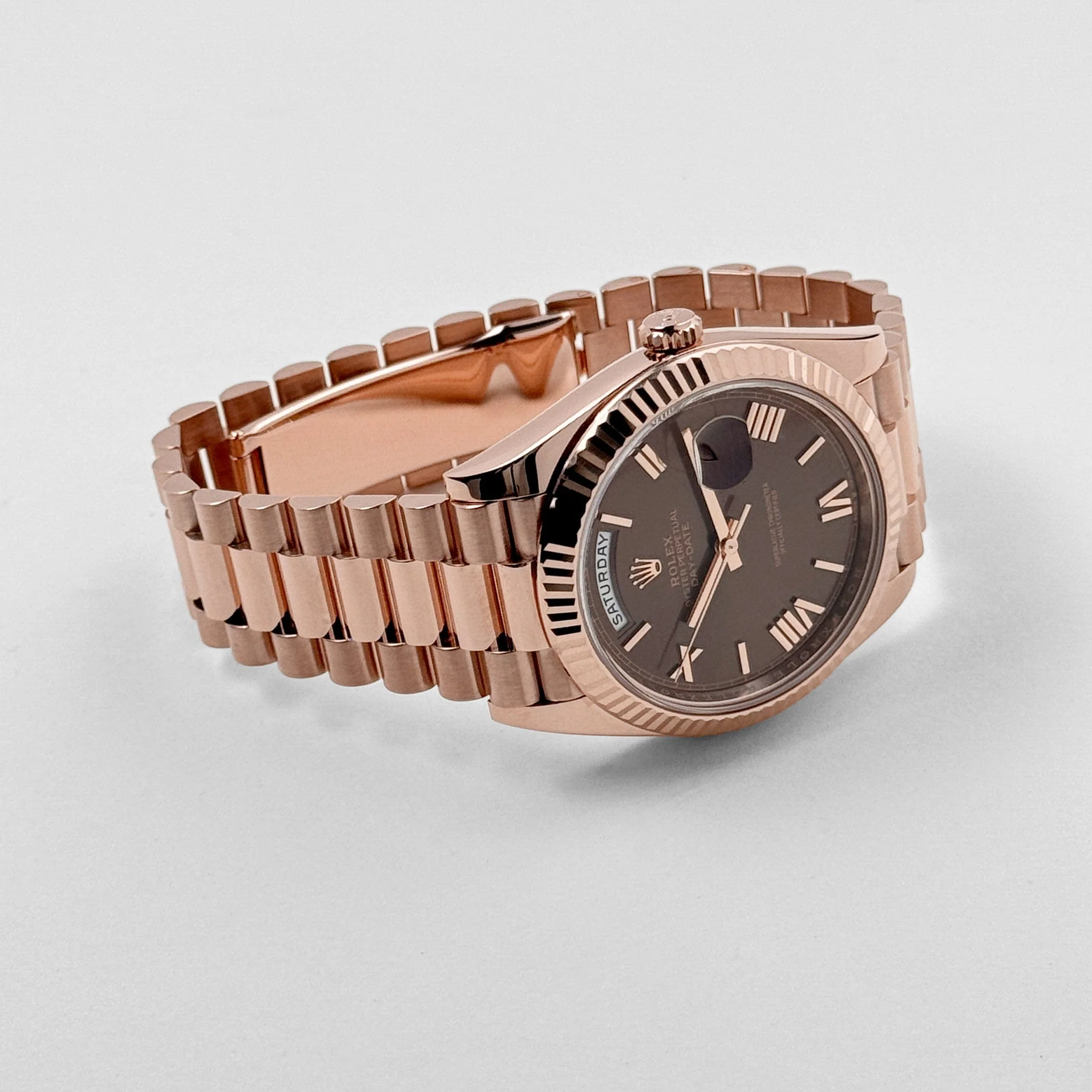 Rolex Day-Date 40 228235 Rose Gold Chocolate Roman Dial (2025)