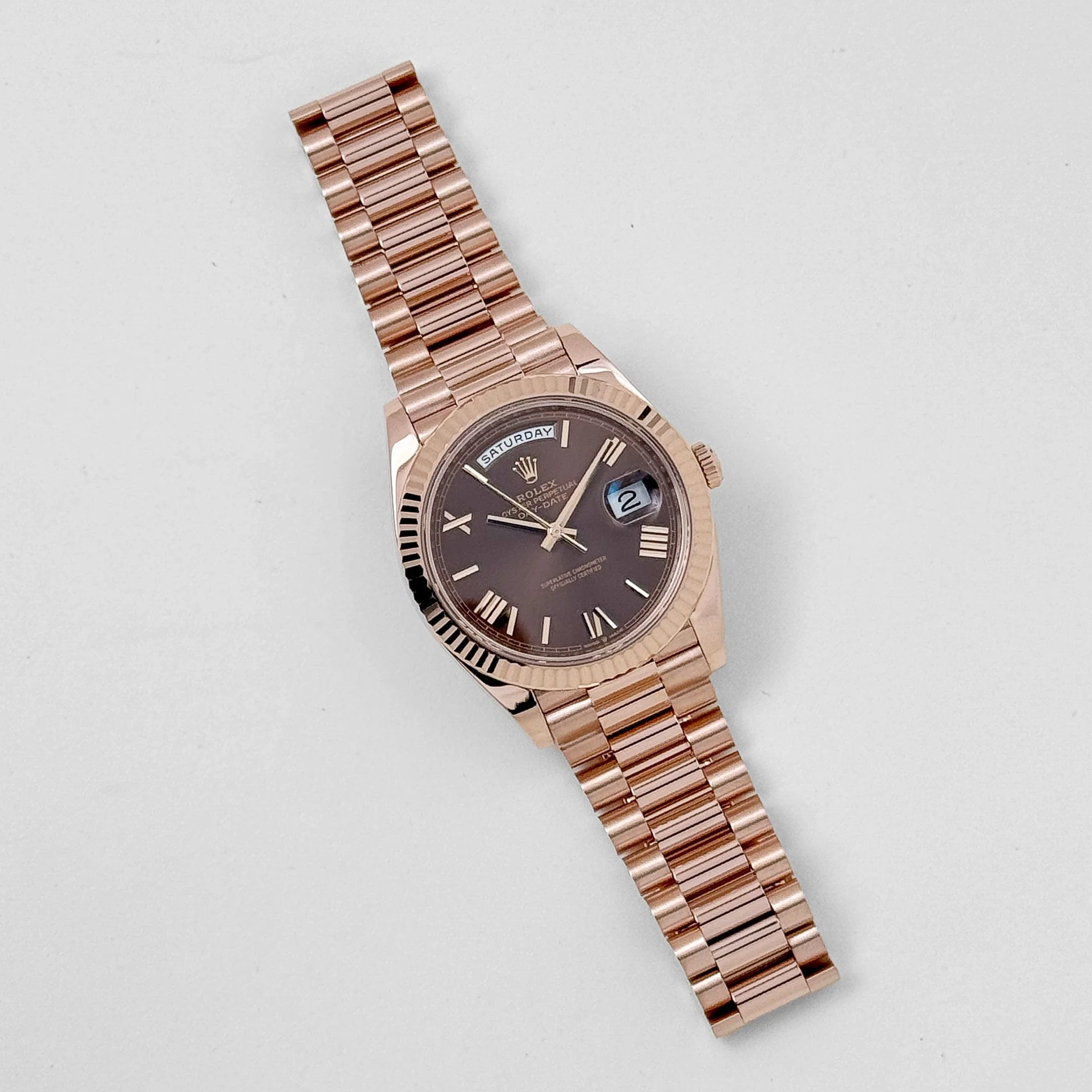 Rolex Day-Date 40 228235 Rose Gold Chocolate Roman Dial (2025)