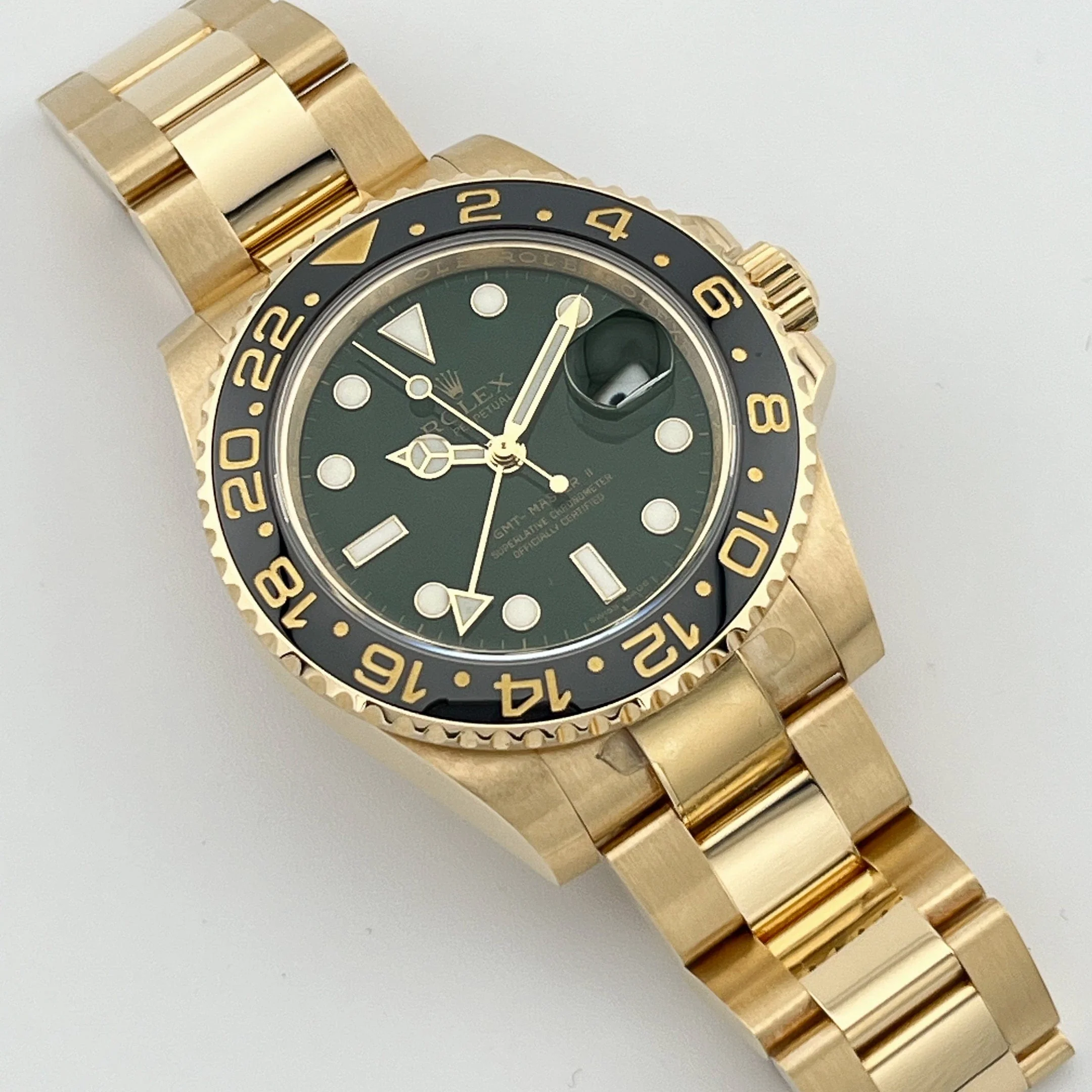 Rolex GMT-Master II 116718LN Yellow Gold Green Dial Black Bezel (2006)