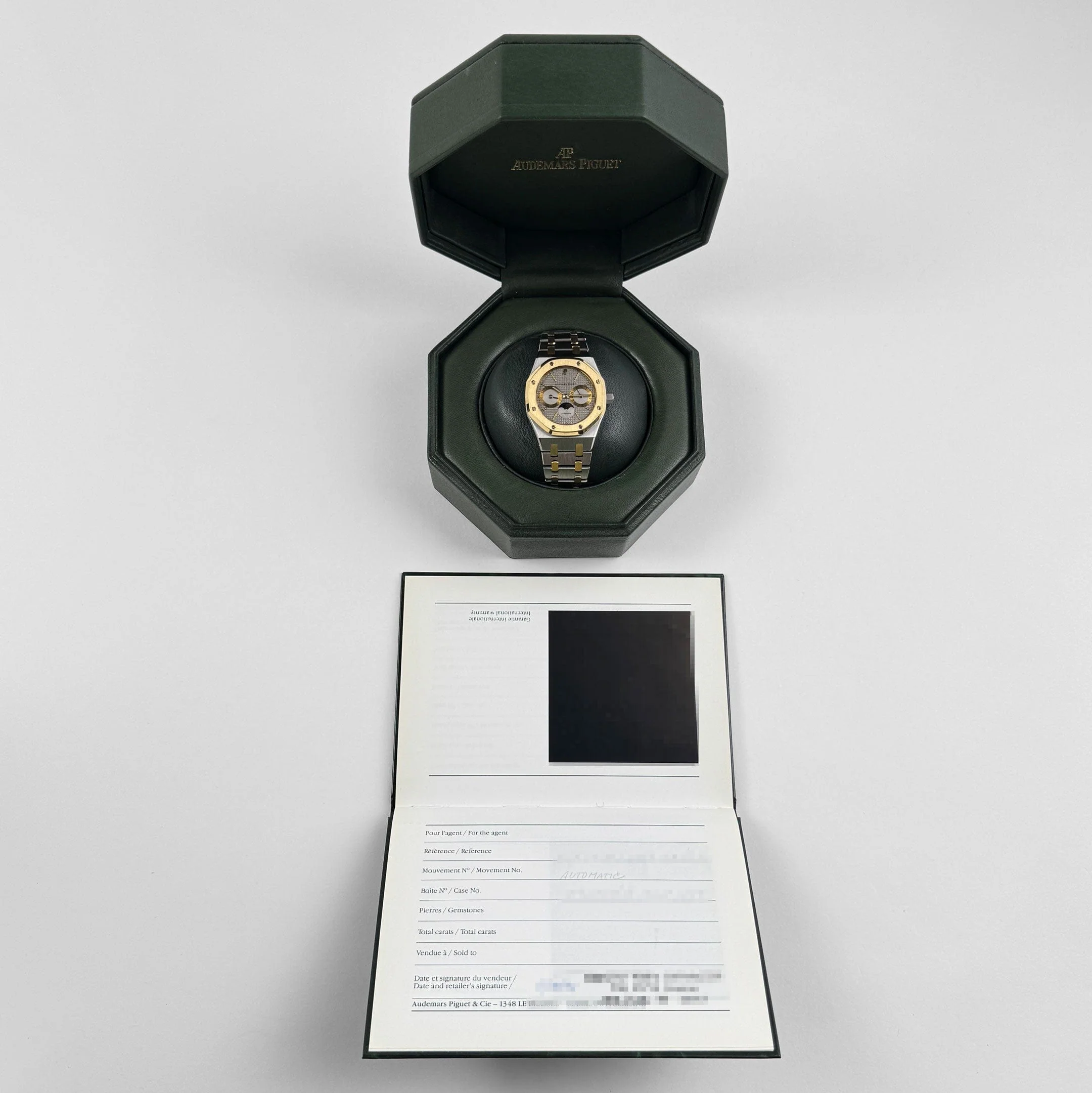 Audemars Piguet Royal Oak 25594SA.OO.0789SA.01 Day-Date Moonphase Yellow Gold Stainless Steel Silver Dial (1994)