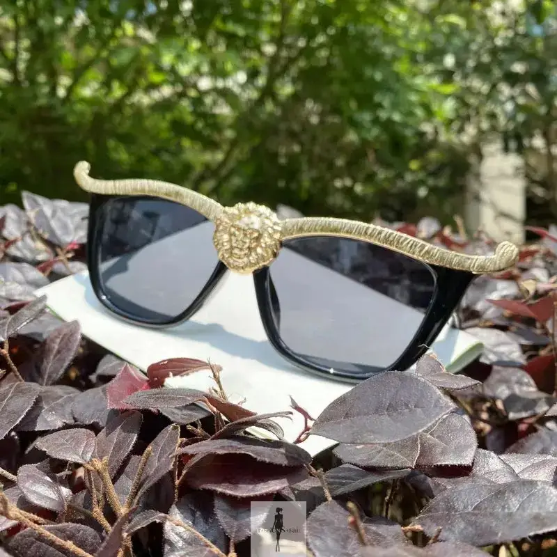 Blue Haired Woman with Lion Head Sunglasses