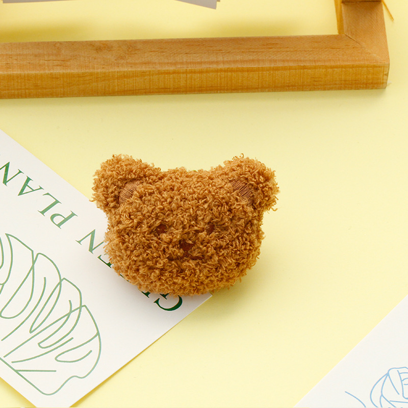 A cute little brown bear brooch
