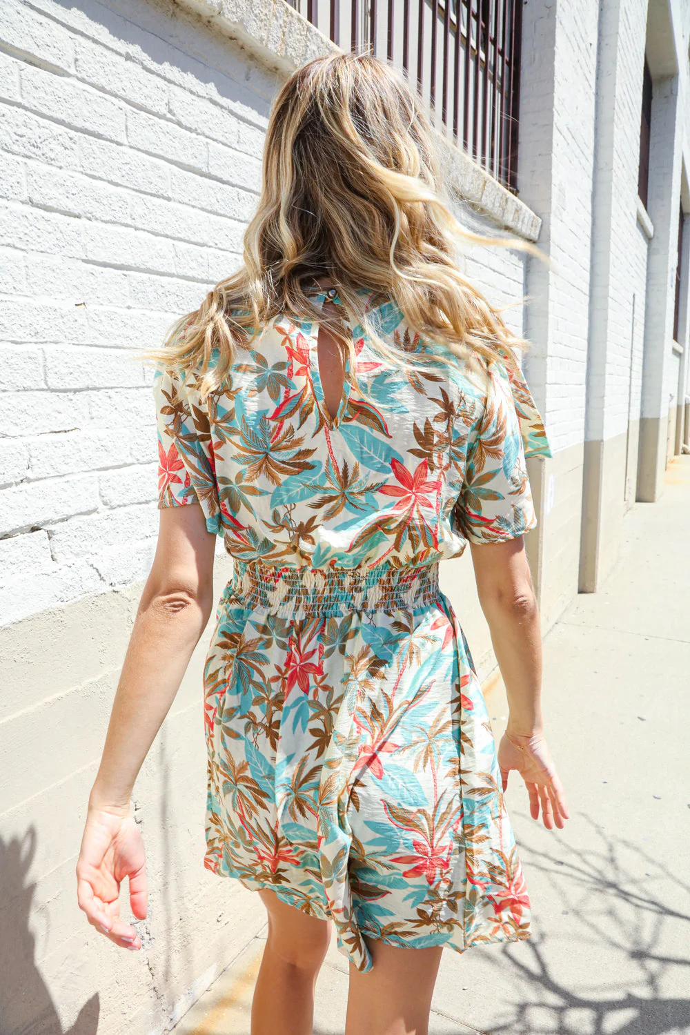 Get Whimsical Tropical Print Smocked Waist Neck Button Romper (Open Pack)